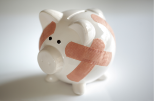 repaired piggy bank- debt relief help